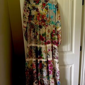 Johnny was dress light and flowy. Buttons all up front  L to XL like new. 200.